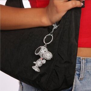 NIB Peanuts Snoopy Silver and Black Bag Charm/ keychain